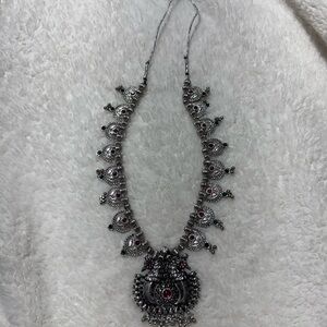 Elegant Silver Necklace with Red Accents